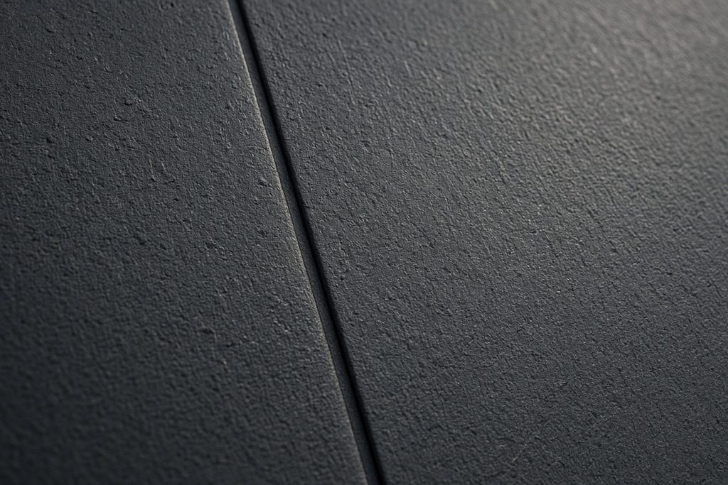Textured bamboo charcoal panel installed as a seamless full-height headboard accent wall in a modern bedroom.